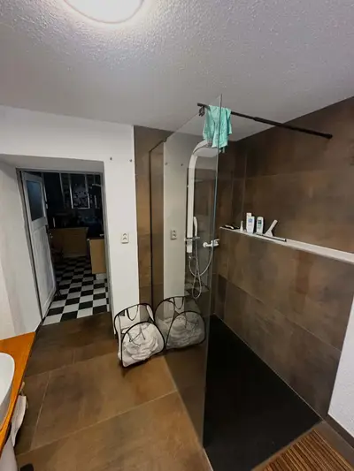 Himmelsscheibe Duschbereich mit Glastrennwand